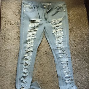 Light blue jeans. Size 13/14